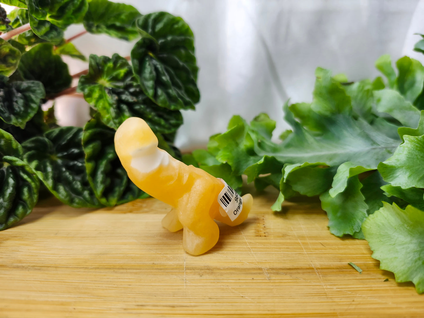 ORANGE CALCITE DICK-A-SAURUS