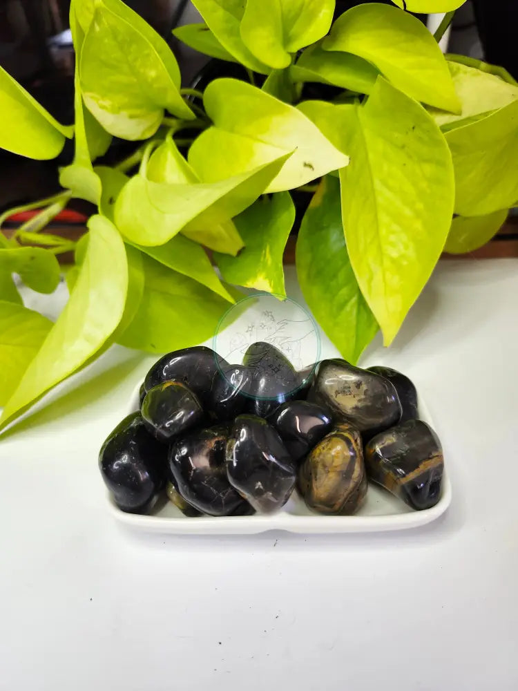 BLACK ONYX TUMBLED STONE - TUMBLED STONES
