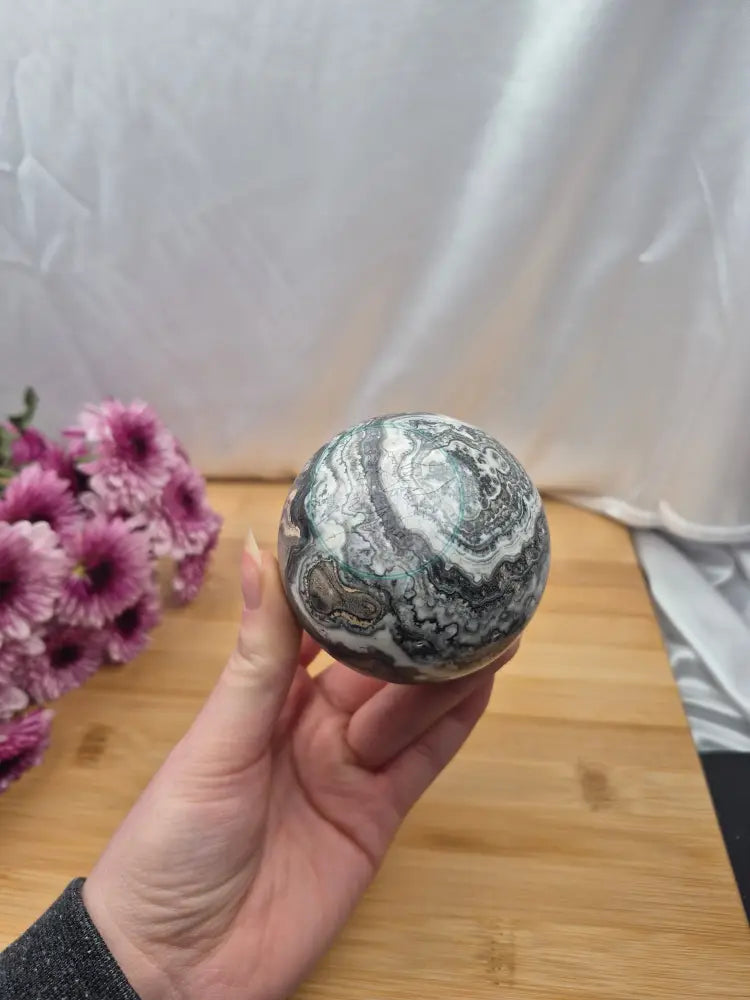 BLACK PHANTOM CALCITE SPHERE