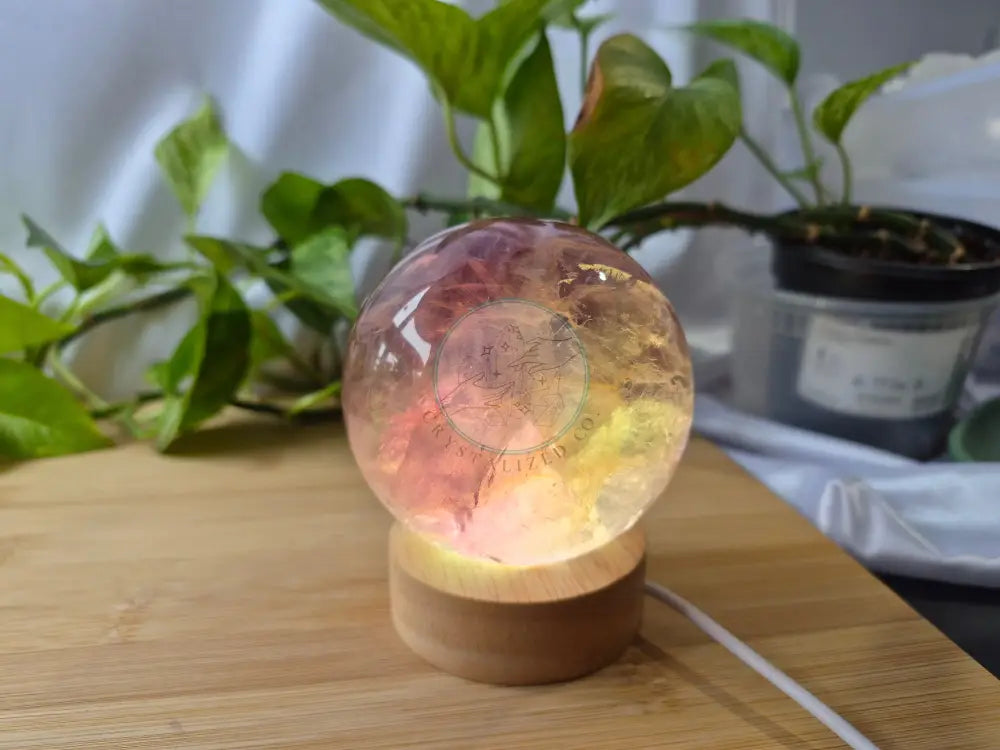 FLUORITE SPHERE W/LIGHT BASE