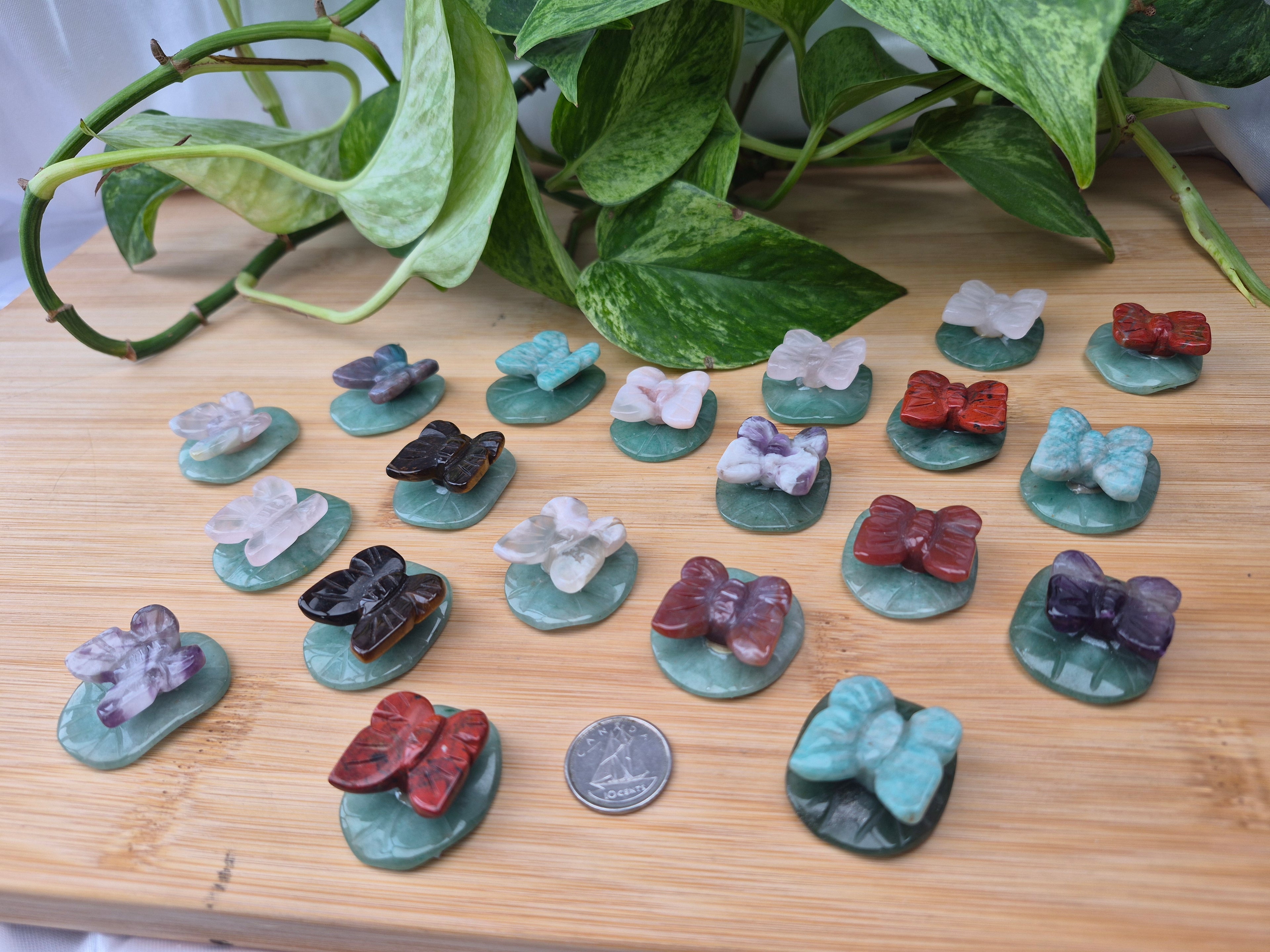 MIXED CRYSTAL BUTTERFLY ON A LILY PAD