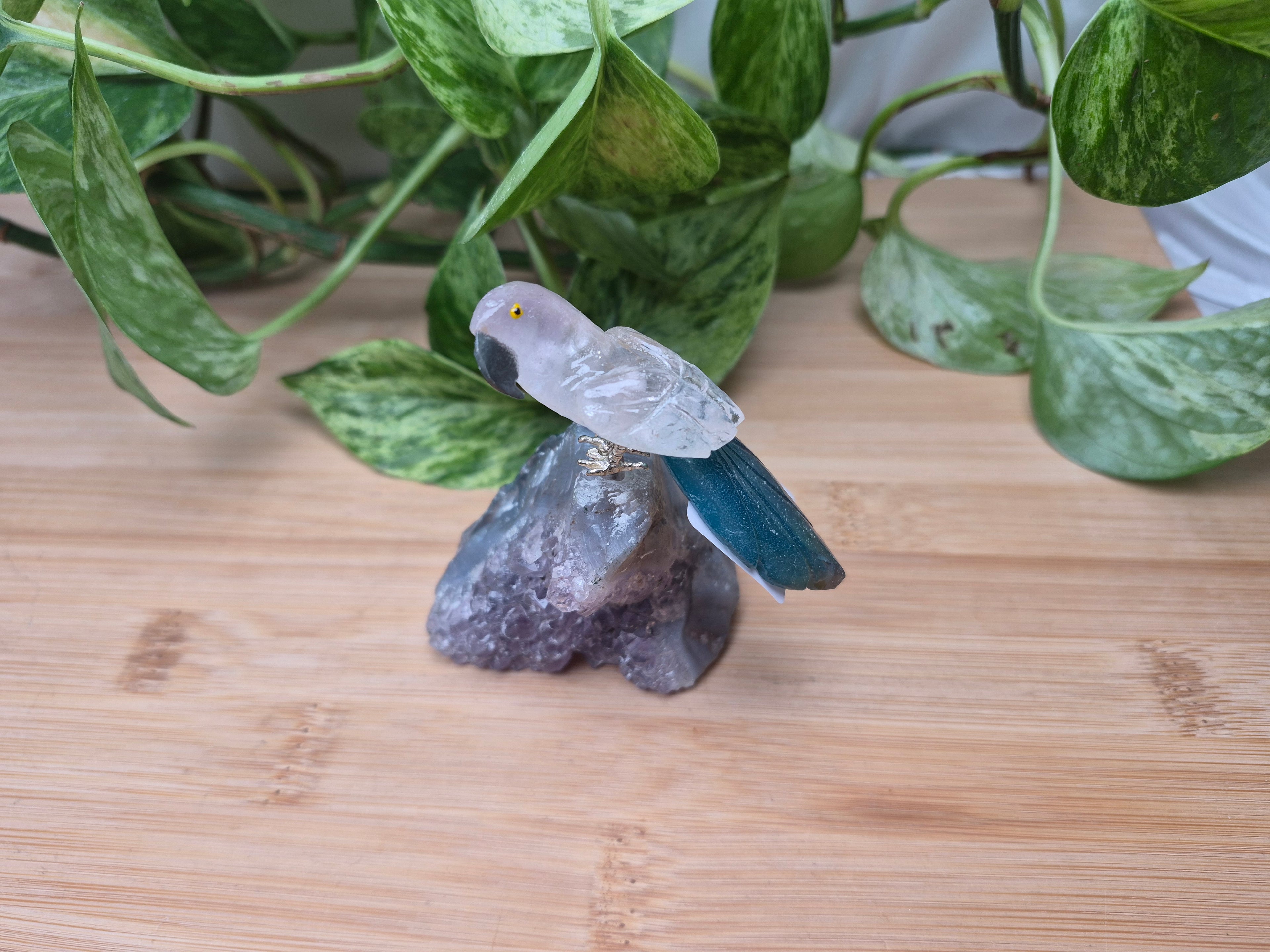CLEAR QUARTZ PARROT ON AMETHYST BASE