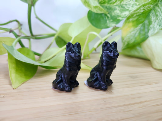 OBSIDIAN SITTING SHEPHERD DOG