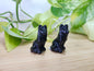 OBSIDIAN SITTING SHEPHERD DOG