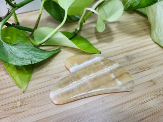 ORANGE CALCITE GUA SHA