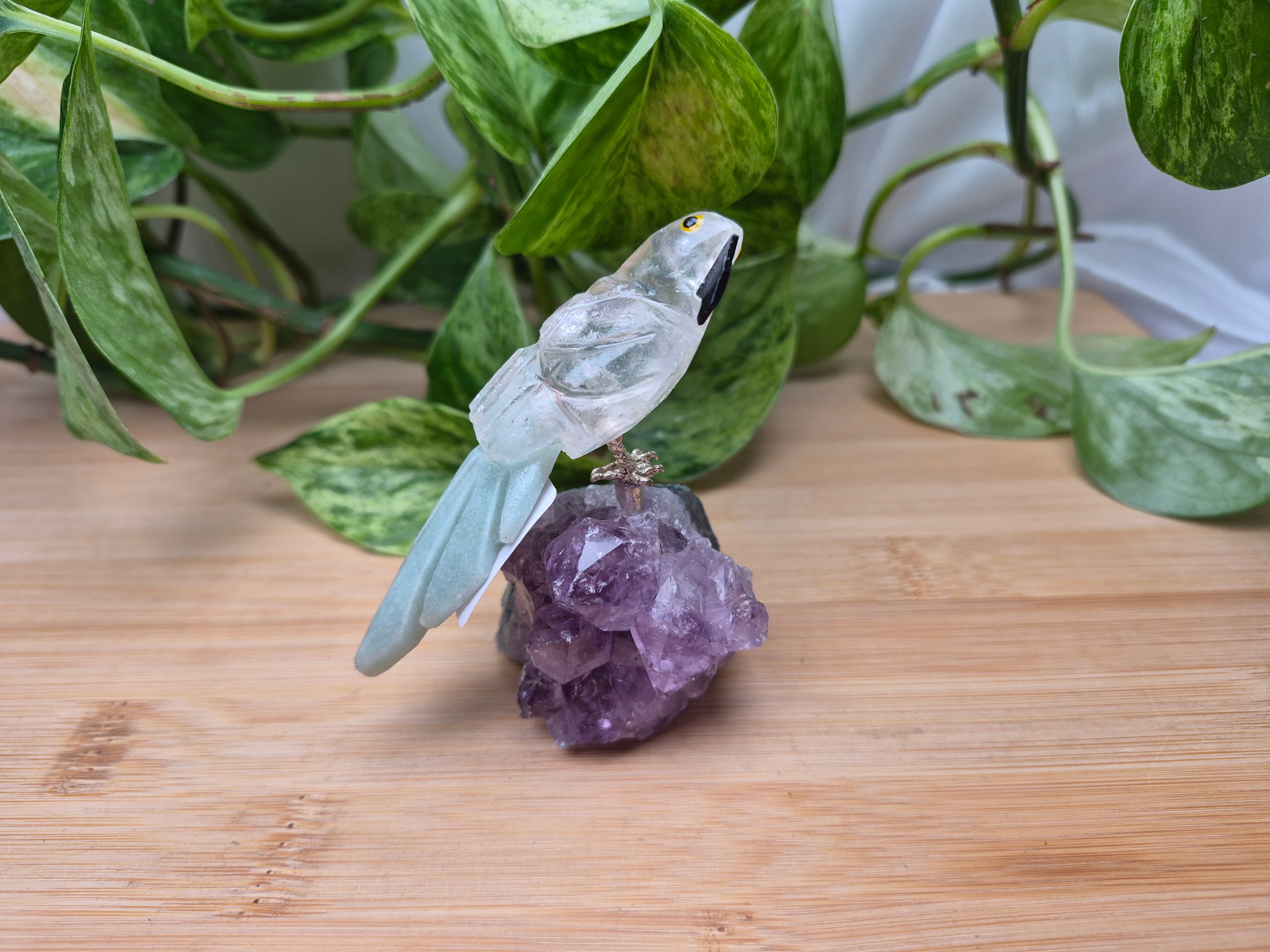 CLEAR QUARTZ PARROT ON AMETHYST BASE