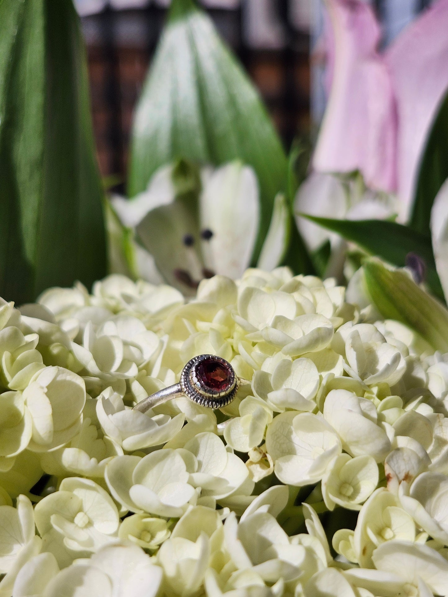 S7.5 GARNET RING .925 STERLING SILVER